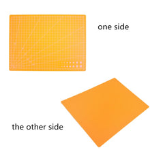 Load image into Gallery viewer, Double Sided Cutting Mat A4 Durable Cut Pad Patchwork Tool Handmade Cutting Plate Dark School Supplies 22x30cm
